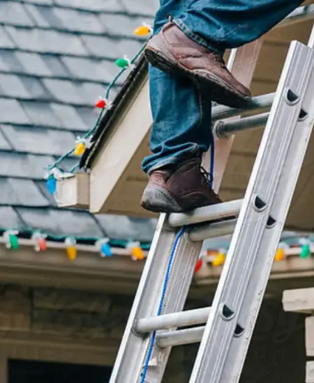 How to Safely Use Ladders When Installing Christmas Lights
